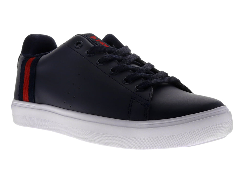 Tenis casuales color marino con suela blanca y detalle de franja roja lateral.