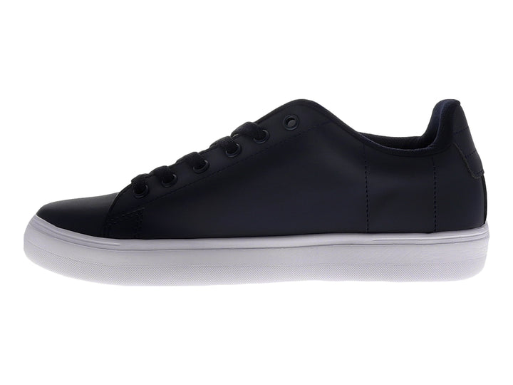 Tenis casuales color marino con suela blanca y detalle de franja roja lateral.