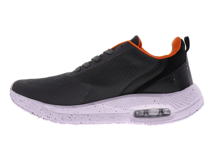 Tenis de baloncesto STARS color gris oxford con detalles en naranja y suela blanca moteada con cámara de aire.