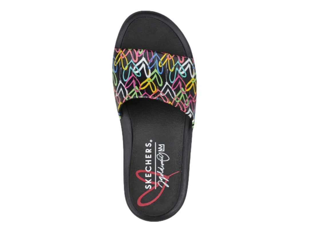 Sandalia Skechers negra para mujer con estampado multicolor estilo grafiti en la banda superior.