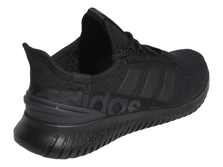 Tenis deportivos Adidas Kaptir 2.0 en color negro, vista lateral sobre fondo blanco.