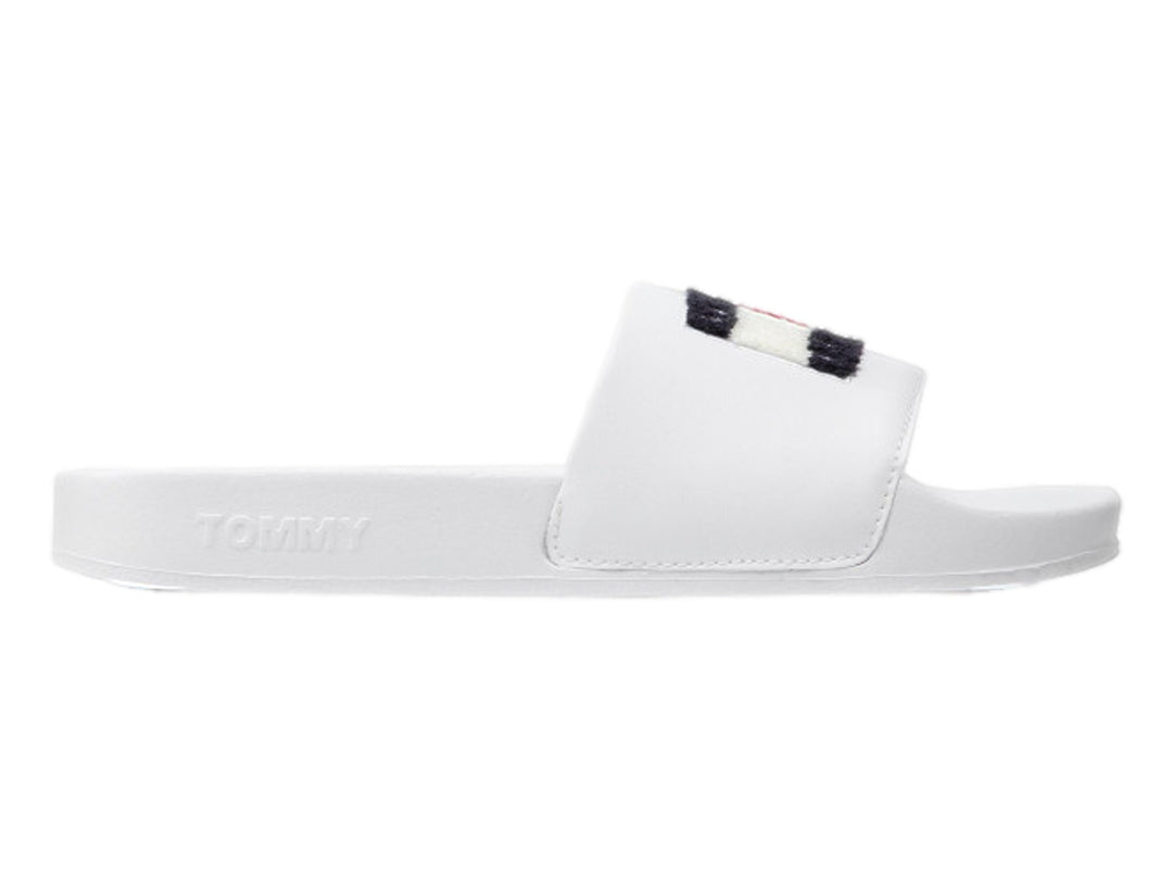 Sandalia blanca tipo slide de Tommy Hilfiger con detalle tricolor en la correa.