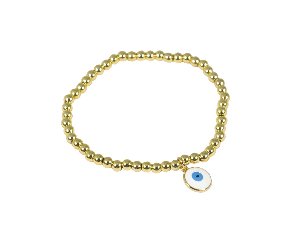 Pulsera dorada de cuentas con un dije colgante en forma de ojo turco blanco y azul.