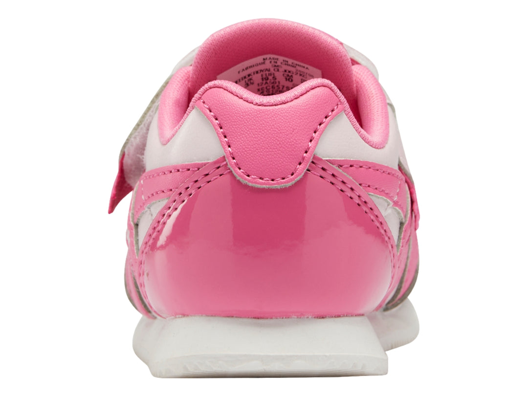 Tenis Reebok para bebé en colores rosa pálido y rosa intenso con cierre de velcro y suela blanca.