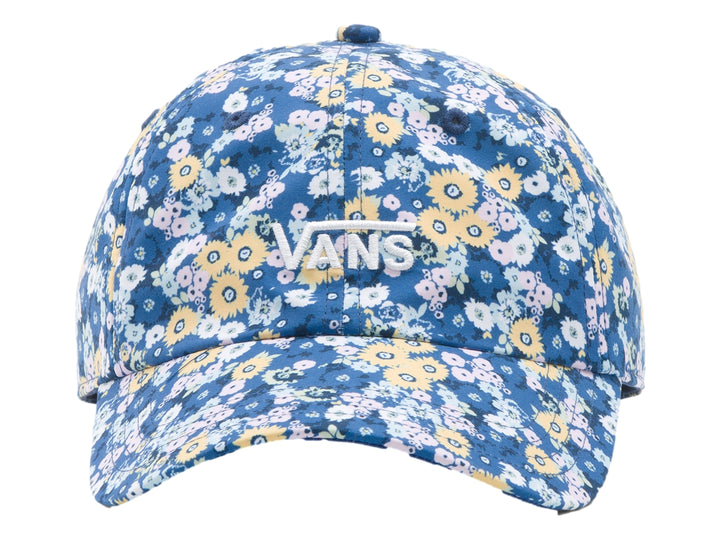Gorra Vans azul con estampado de flores amarillas y rosas en tonos pastel y logotipo blanco al frente.