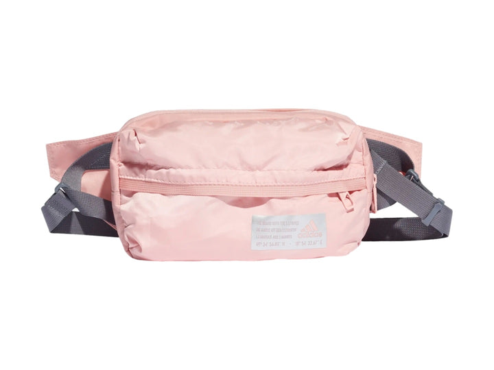 Riñonera Adidas de color rosa con correa gris y cierre frontal.