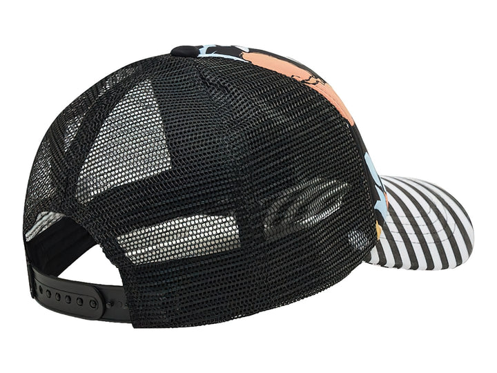 Gorra con estampado de flores tropicales en la corona y visera a rayas blancas y negras.