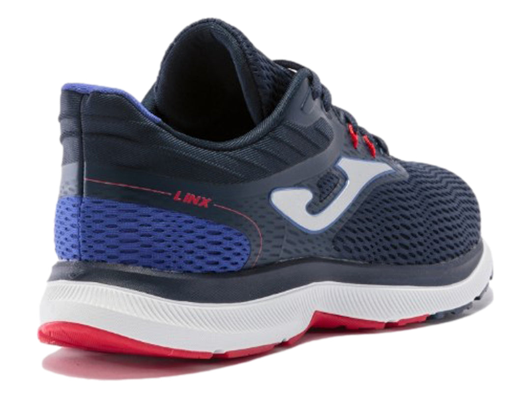 Tenis deportivos Joma Linx color azul marino con suela blanca y detalles rojos para hombre.