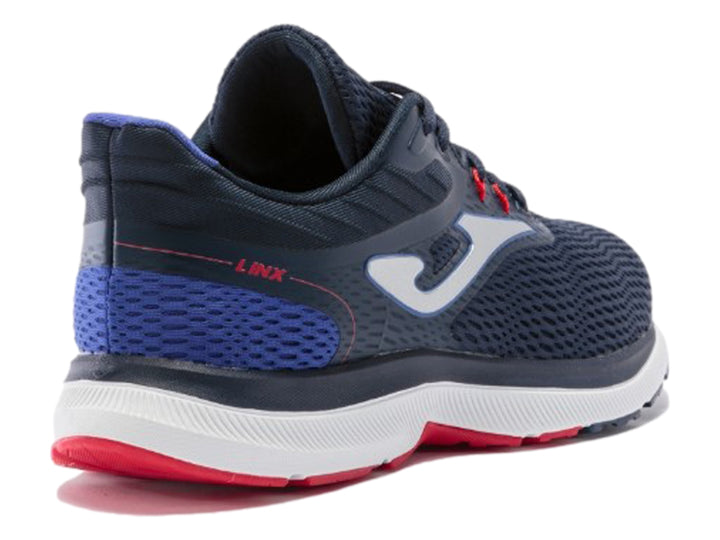 Tenis deportivos Joma Linx color azul marino con suela blanca y detalles rojos para hombre.