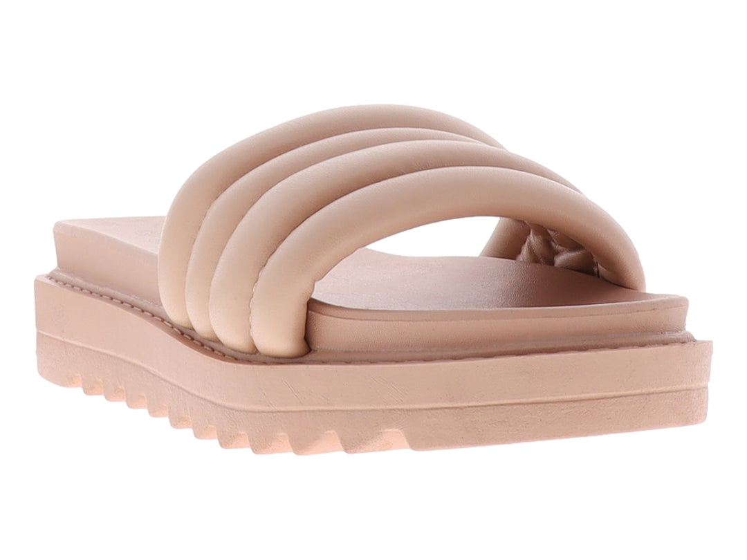 Sandalia de plataforma color rosa con tiras acolchadas y suela dentada.