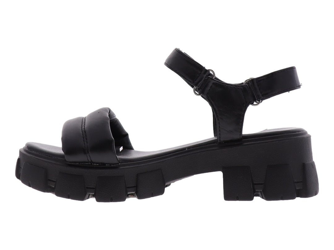 Sandalia negra de plataforma con suela track y correas ajustables.
