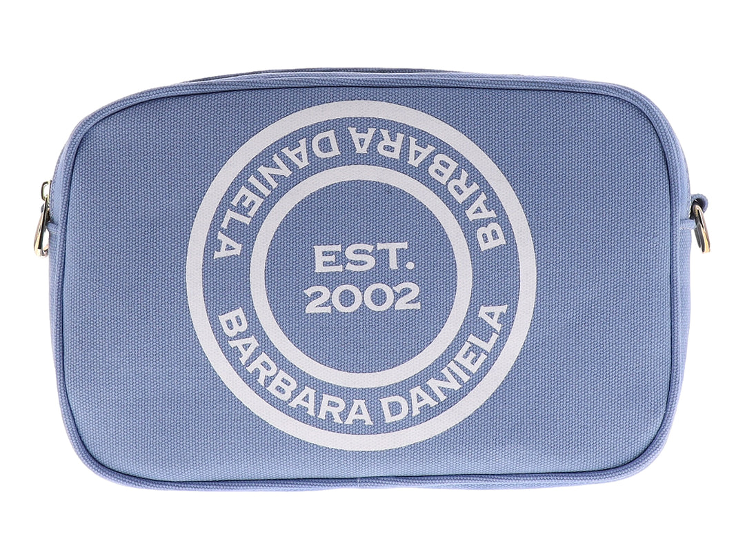 Bolsa de hombro color azul marino con logotipo circular blanco de Barbara Daniela en el centro.