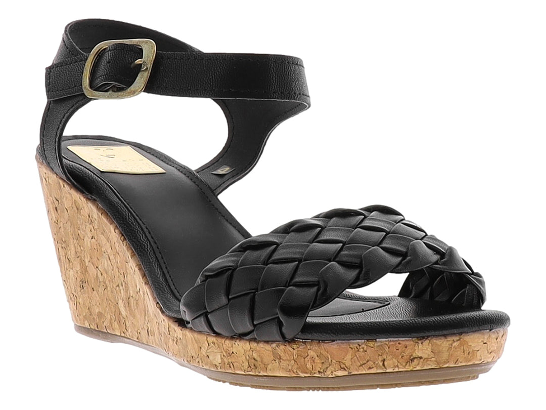 Sandalia de cuña color negro con correa trenzada y plataforma de corcho.