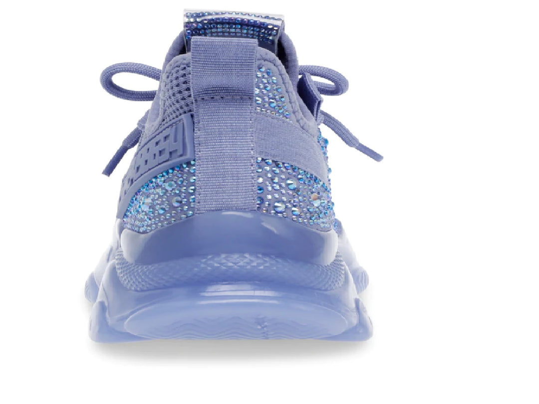 Tenis Steve Madden color morado periwinkle con detalles brillantes y suela gruesa para mujer.
