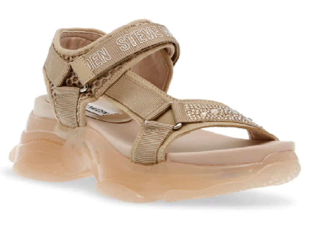 Sandalia Steve Madden color beige con plataforma gruesa, correas ajustables y detalles de pedrería en la parte frontal.