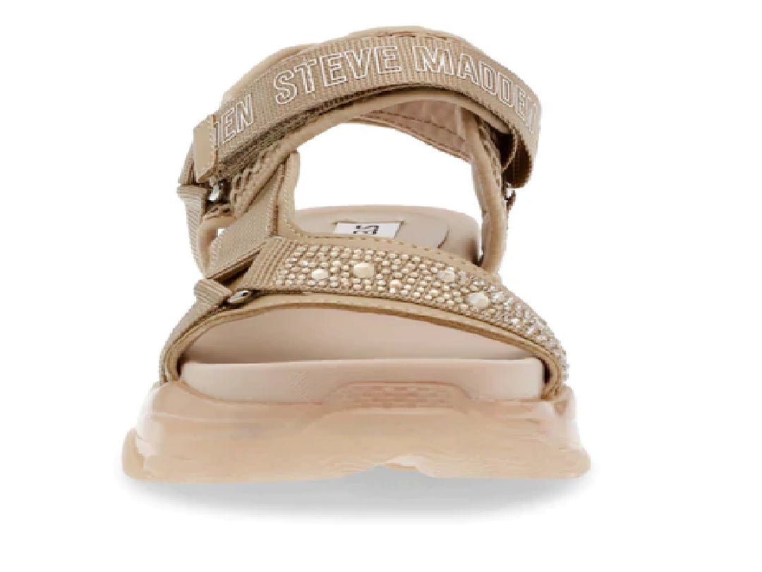 Sandalia Steve Madden color beige con plataforma gruesa, correas ajustables y detalles de pedrería en la parte frontal.