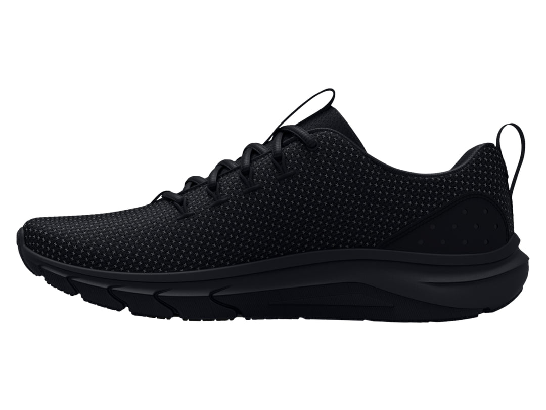 Tenis deportivos Under Armour UA Phade RN 2 en color negro total con textura de malla y suela deportiva.