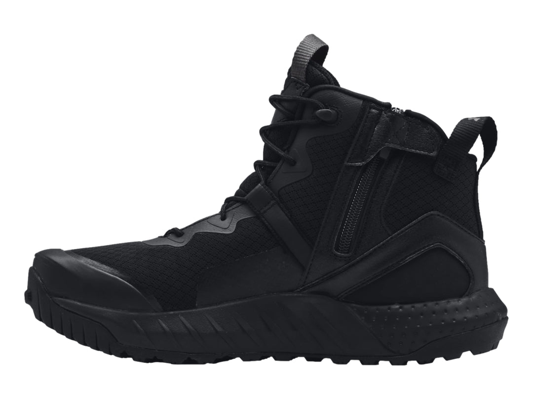 Bota deportiva Under Armour UA Micro G Valsetz Zip Mid en color negro con suela gruesa y diseño táctico.