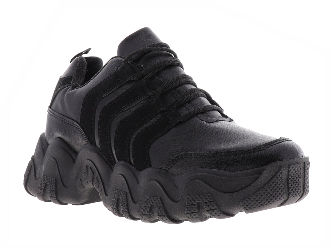 Tenis urbanos para Mujer en color negro con suela gruesa y esculpida.