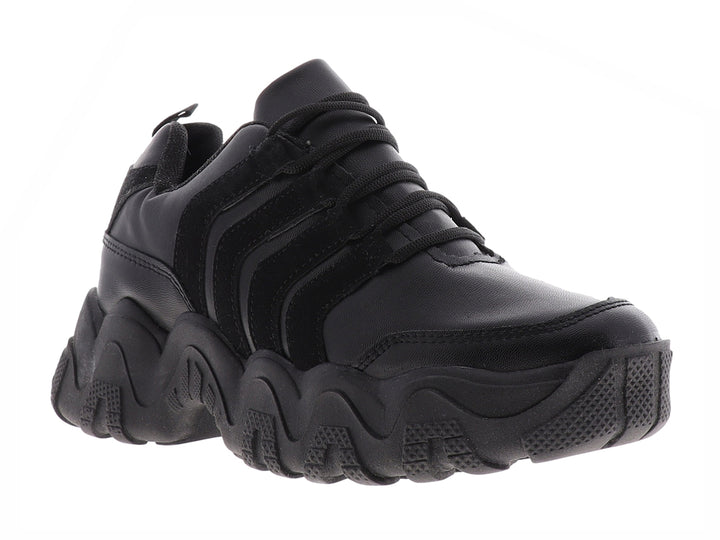 Tenis urbanos para Mujer en color negro con suela gruesa y esculpida.