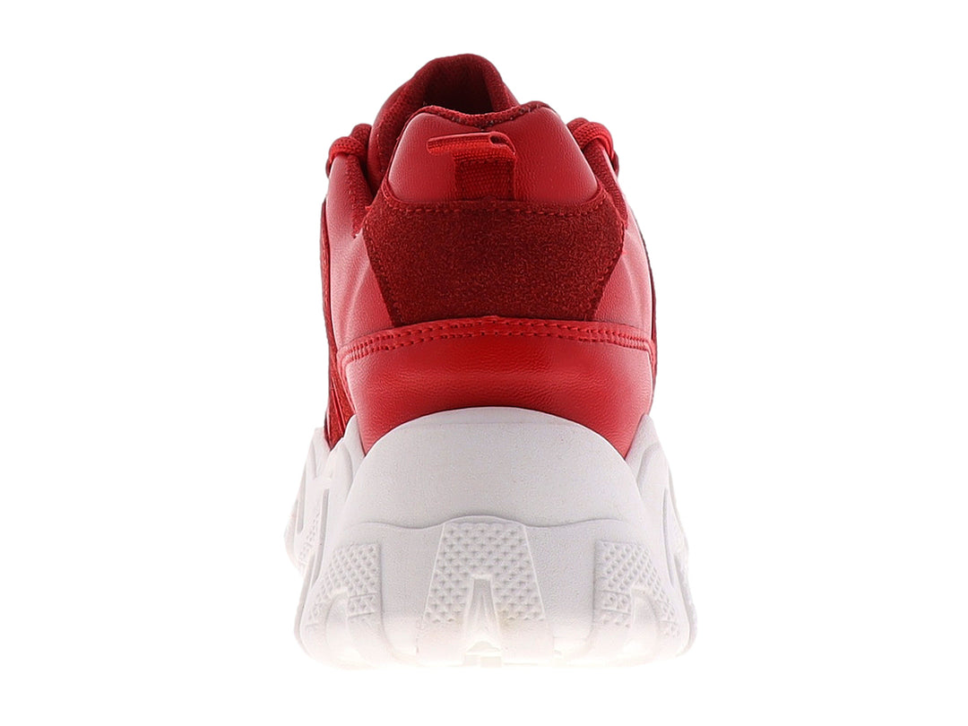 Tenis deportivos color rojo con suela blanca gruesa y diseño ondulado.