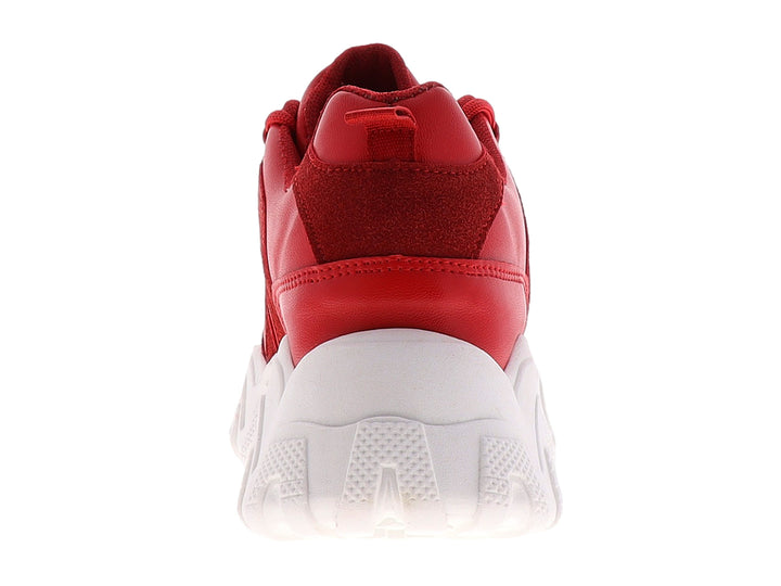 Tenis deportivos color rojo con suela blanca gruesa y diseño ondulado.