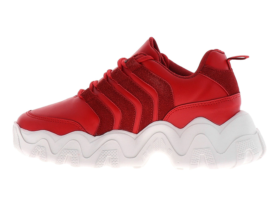 Tenis deportivos color rojo con suela blanca gruesa y diseño ondulado.