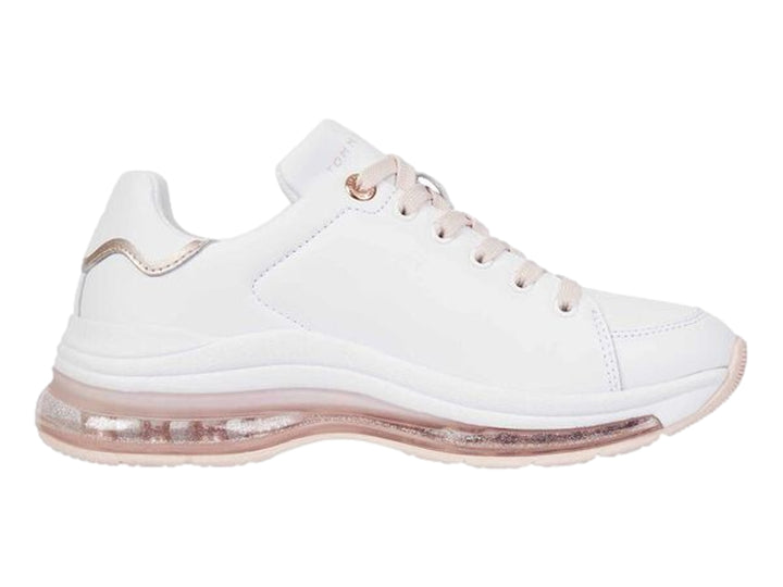Tenis Tommy Hilfiger color blanco con detalles y suela de aire en tono rosa para mujer.