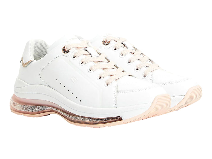 Tenis Tommy Hilfiger color blanco con detalles y suela de aire en tono rosa para mujer.