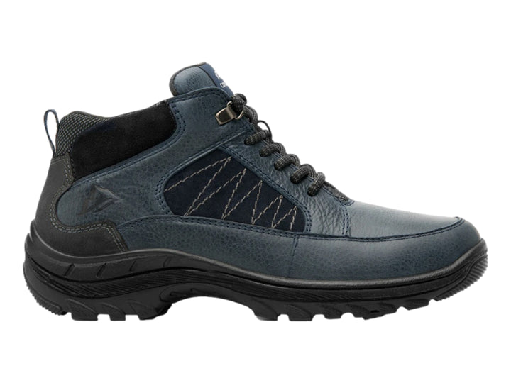 Zapato Flexi azul oscuro con suela negra dentada y acabados en cuero.