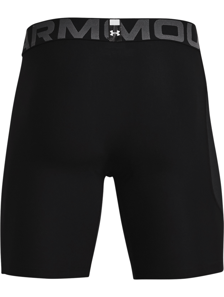 Pantalones cortos deportivos de compresión Under Armour en color negro con cintura elástica y logo blanco.