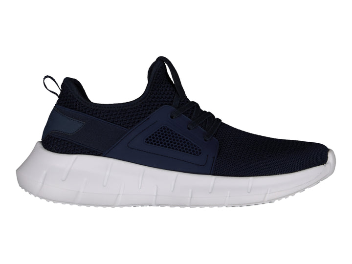 Tenis deportivos Charly color marino con suela blanca y tejido transpirable.