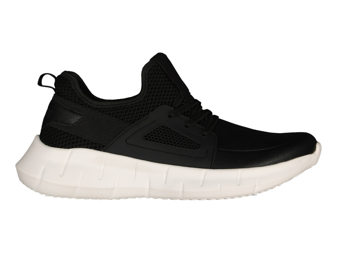 Tenis deportivos Charly en color negro con suela gruesa de color blanco.