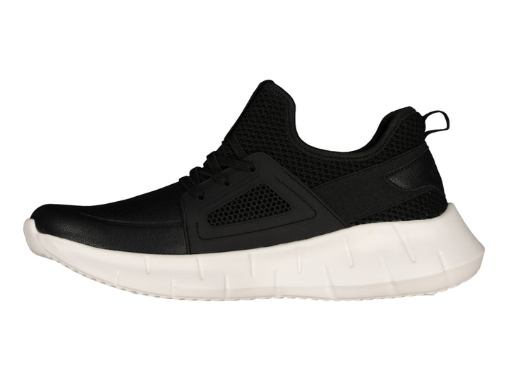 Tenis deportivos Charly en color negro con suela gruesa de color blanco.