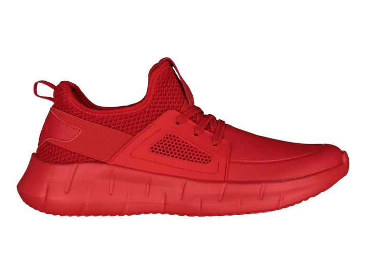 Tenis deportivos Charly de color rojo con detalles de malla y suela gruesa.