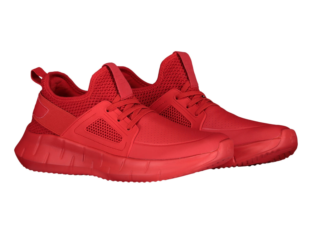 Tenis deportivos Charly de color rojo con detalles de malla y suela gruesa.