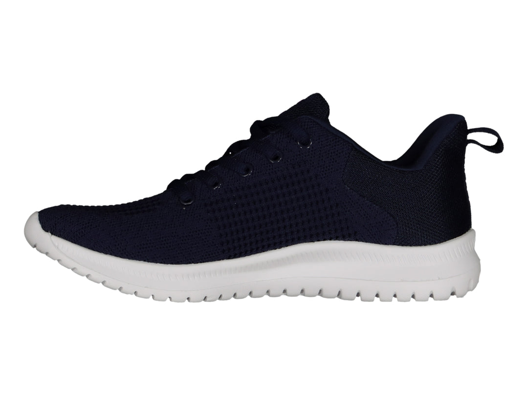 Tenis deportivos Charly color azul marino con suela blanca y detalles en rosa.