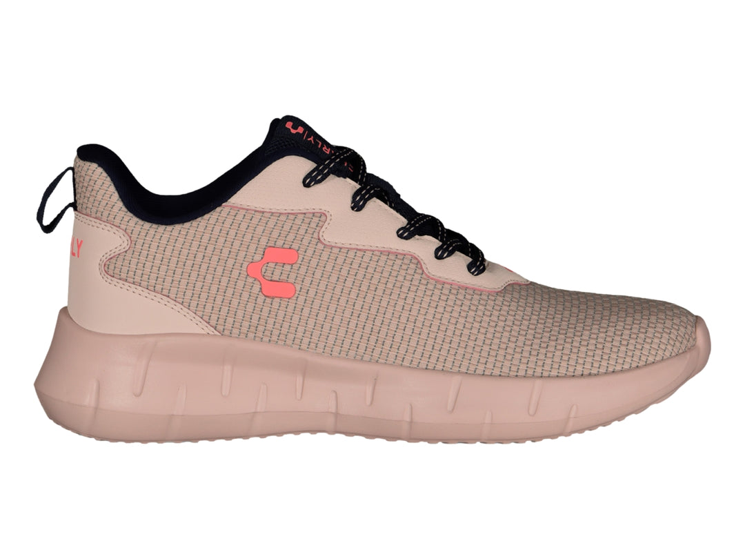 Tenis deportivos Charly color rosa palo con detalles en negro.