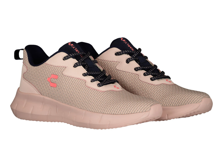 Tenis deportivos Charly color rosa palo con detalles en negro.