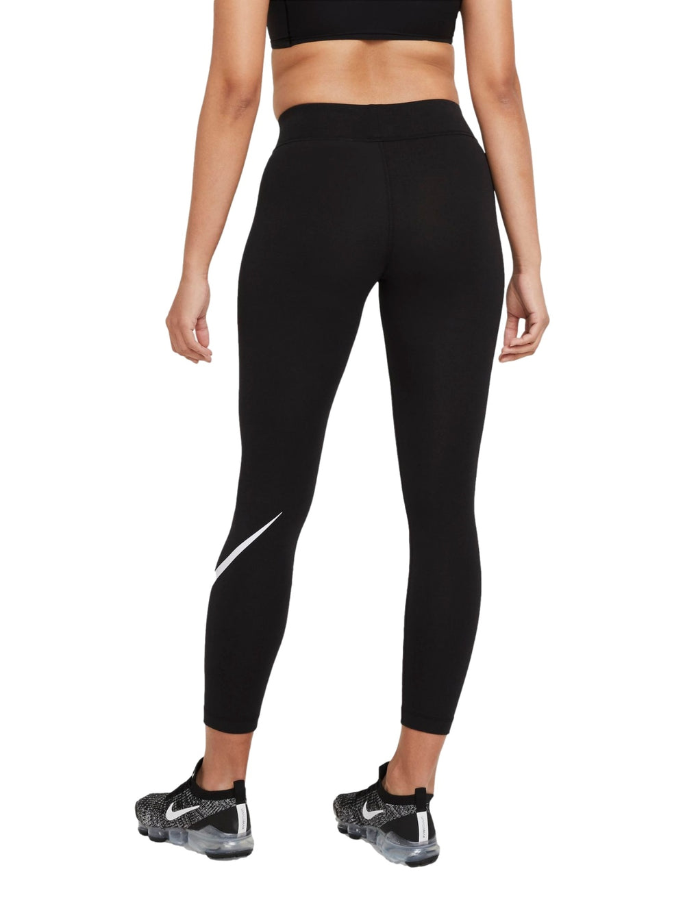 Mallas deportivas Nike de color negro con logotipo blanco en la pierna izquierda, ajustadas al cuerpo.