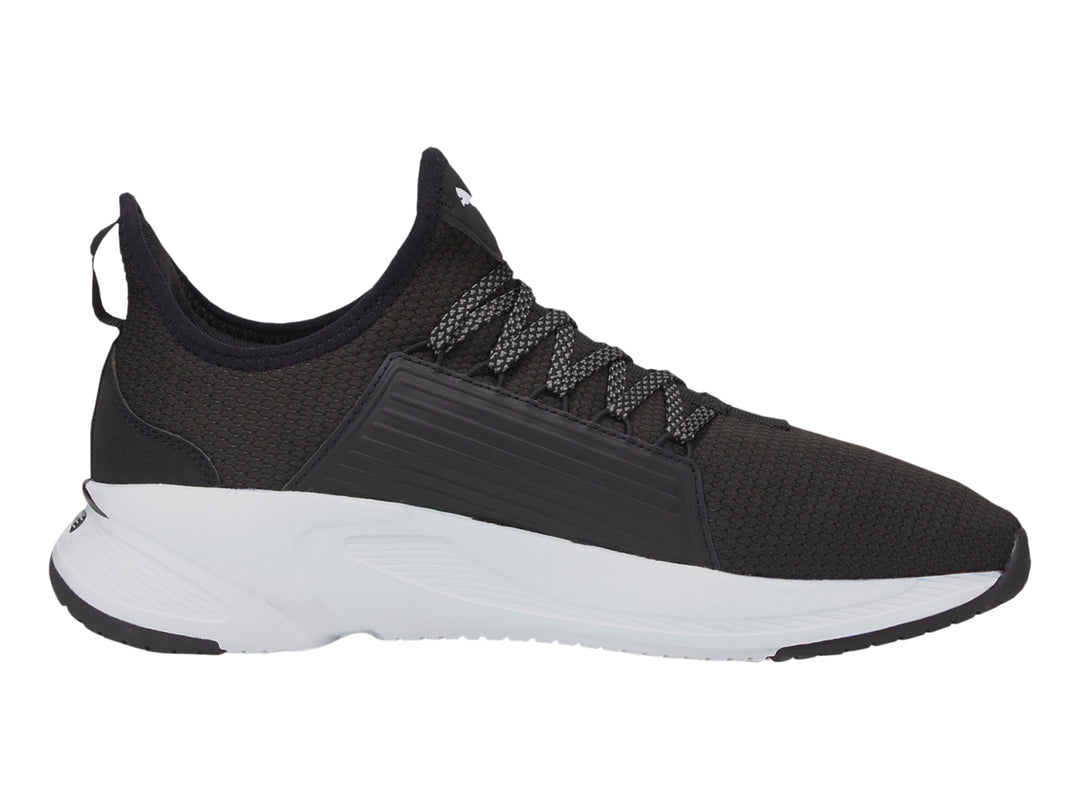 Tenis PUMA Softride Premier Slip-On en color negro con suela blanca y diseño deportivo.