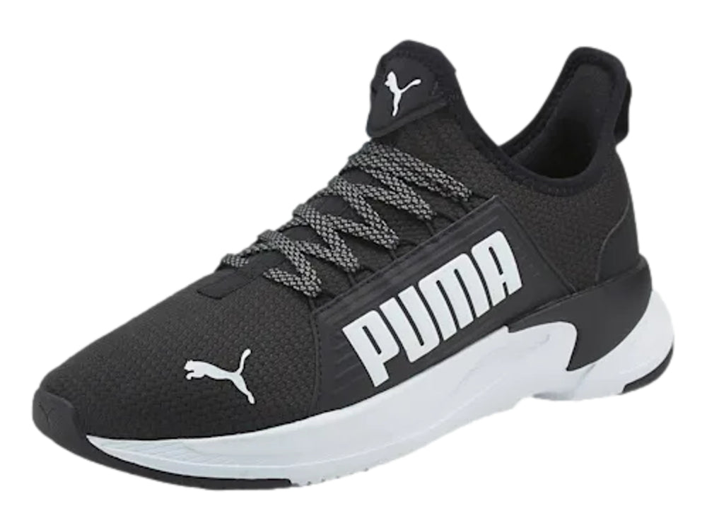 Tenis PUMA Softride Premier Slip-On en color negro con suela blanca y diseño deportivo.