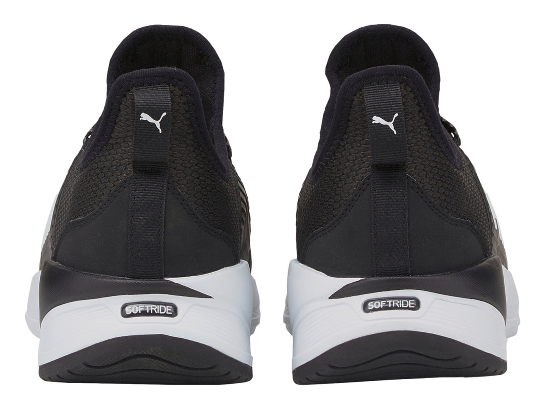 Tenis PUMA Softride Premier Slip-On en color negro con suela blanca y diseño deportivo.