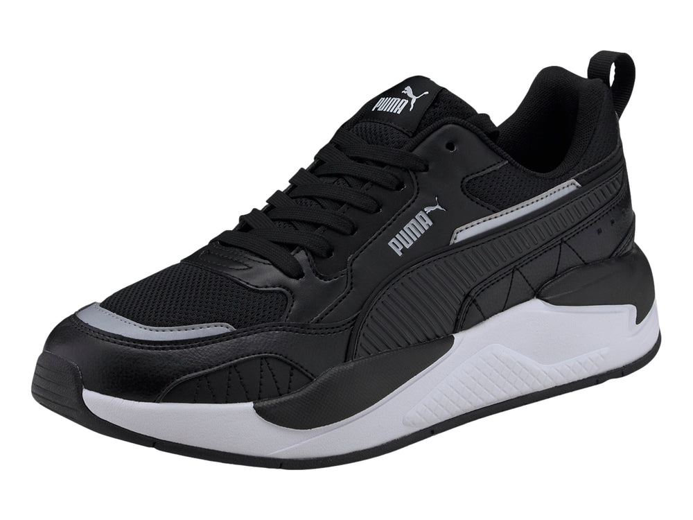 Tenis deportivos Puma X-Ray 2 Square color negro con suela blanca, vista lateral.