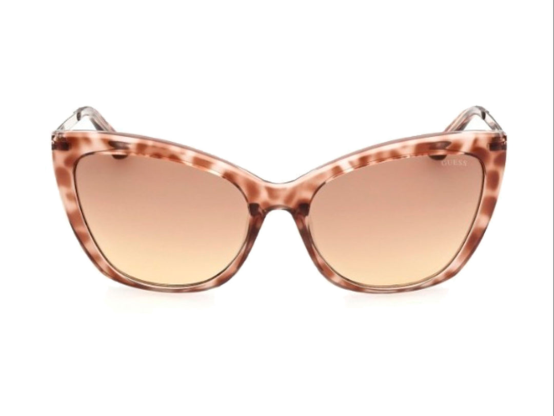 Lentes de sol GUESS para mujer con montura estilo cat-eye en color carey marrón y micas degradadas.