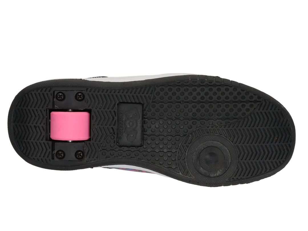 Tenis Heelys negros con estampado de remolinos rosa y amarillo, suela blanca y acabado brillante.