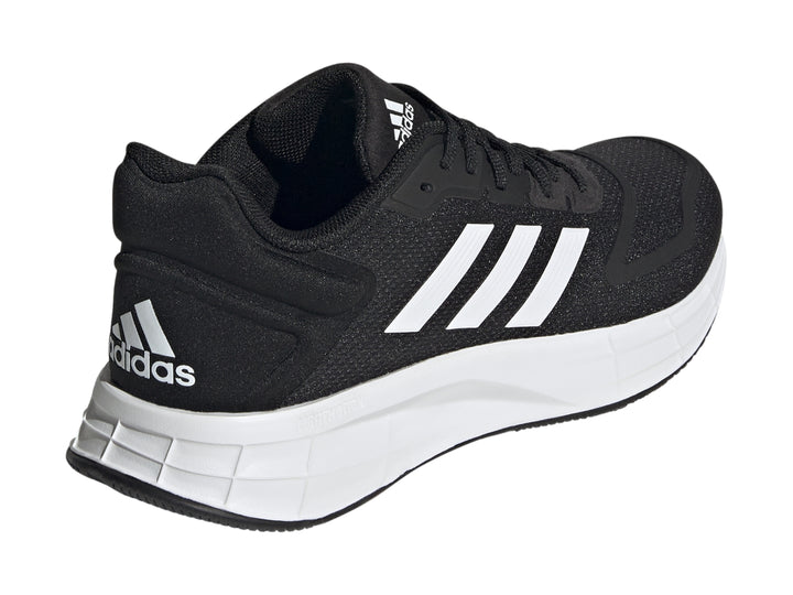 Tenis Adidas Duramo 10 en color negro con franjas y suela blancas, vista lateral.