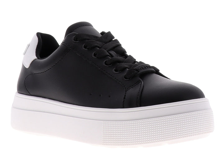 Tenis urbanos Westies color negro con suela blanca de plataforma y cordones negros.