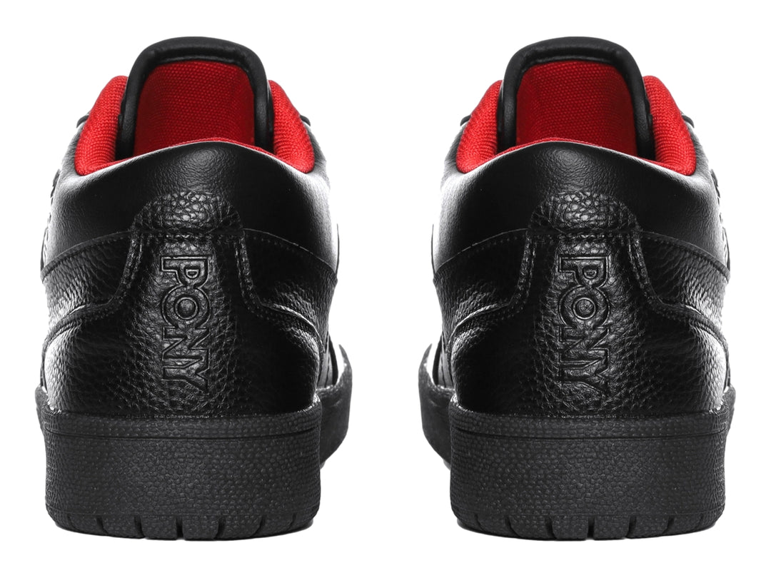 Tenis PONY color negro con detalles rojos en el interior y suela negra.
