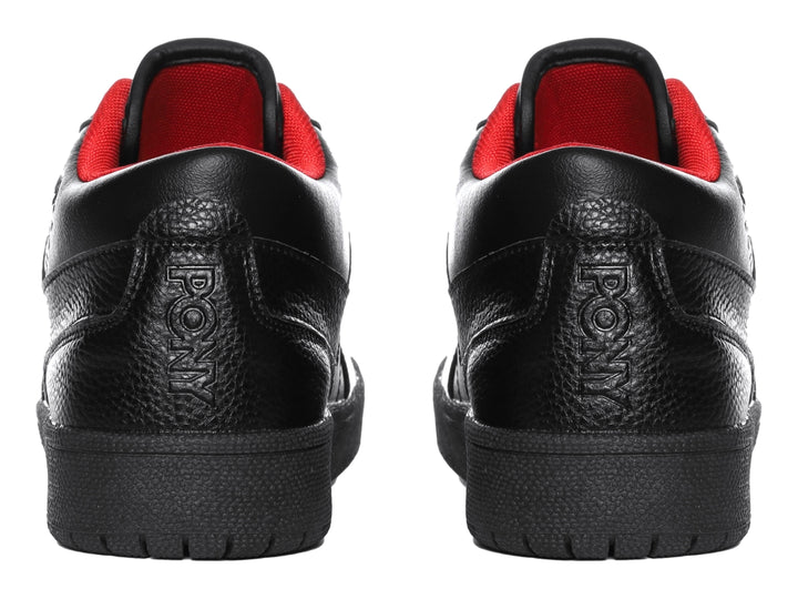 Tenis PONY color negro con detalles rojos en el interior y suela negra.